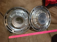 2 Vintage Chevrolet Hubcaps