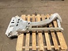 Silver 13-18 RAM 1500 front left driver frame apron radiator support with jagged edges on a wooden pallet.