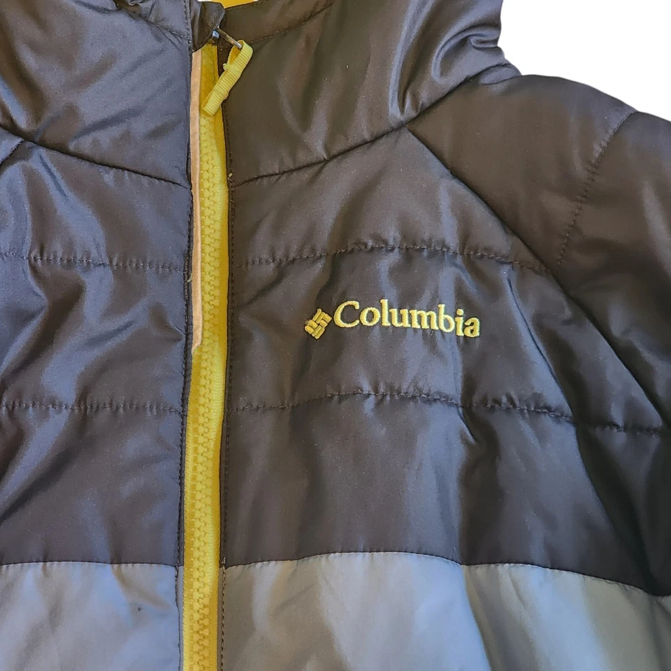 Abrigo acolchado de invierno ligero unisex Columbia gris/amarillo/negro con cremallera grande Foto 2 de 4