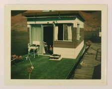 FOUND PHOTO Flatbed Mobile Trailer Home Tiny House Vtg Land Polaroid 1960's 