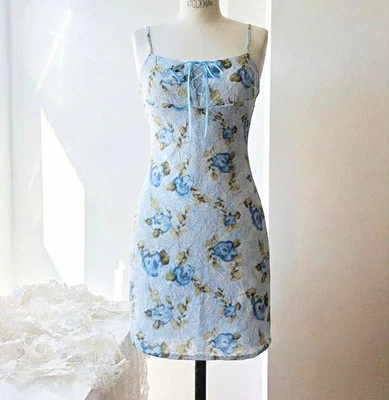 Vintage 90s-Inspired Floral Slip Dress with Corset-Style Detailing - Image 1 of 4