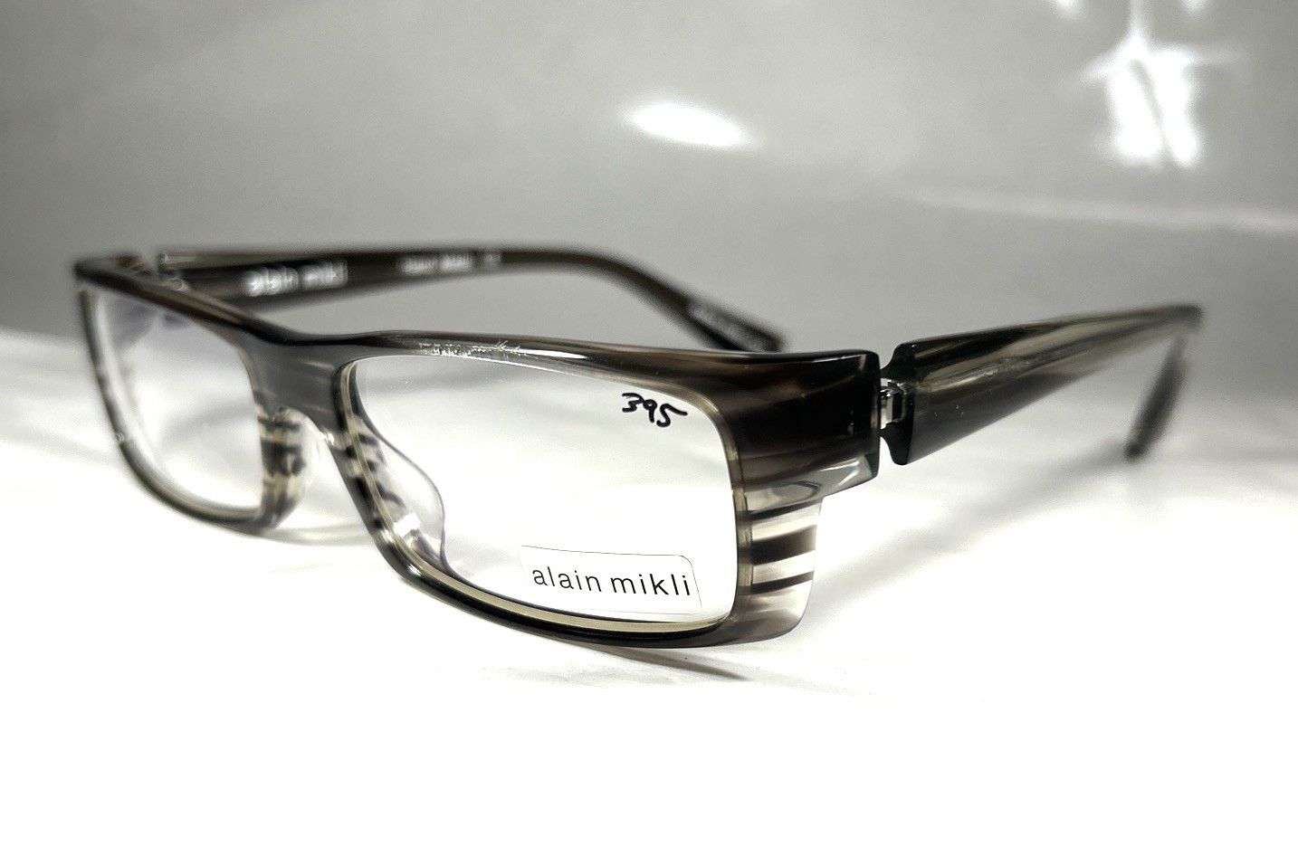 Alain Mikli A0489 12 Eyeglasses Frame, Hand Made, Gray Clear, Size: 53-15-135