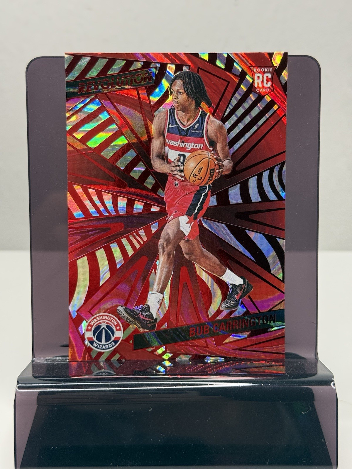 2024-25 Panini Revolution Bub Carrington #121 Red Swirl (RC)