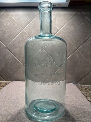 Watchung Spring Water Aqua Embossed Mineral Water Bottle Arrow Design