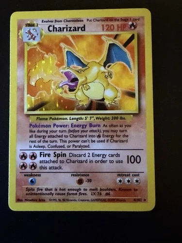 Charizard 4/102 Base Set 1999 Holo Rare Pokémon TCG Card (LP-MP)