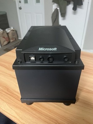 The item pictured is a Microsoft Digital Sound System 80 (DSS80) subwoofer/amp