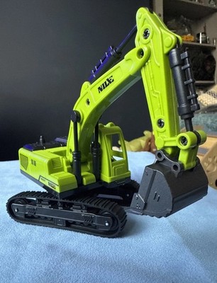 Nilbagger. Kunststoff. 9 Zoll lang mit Arm komplett ausgefahren. Grün/Schwarz. Neu.
