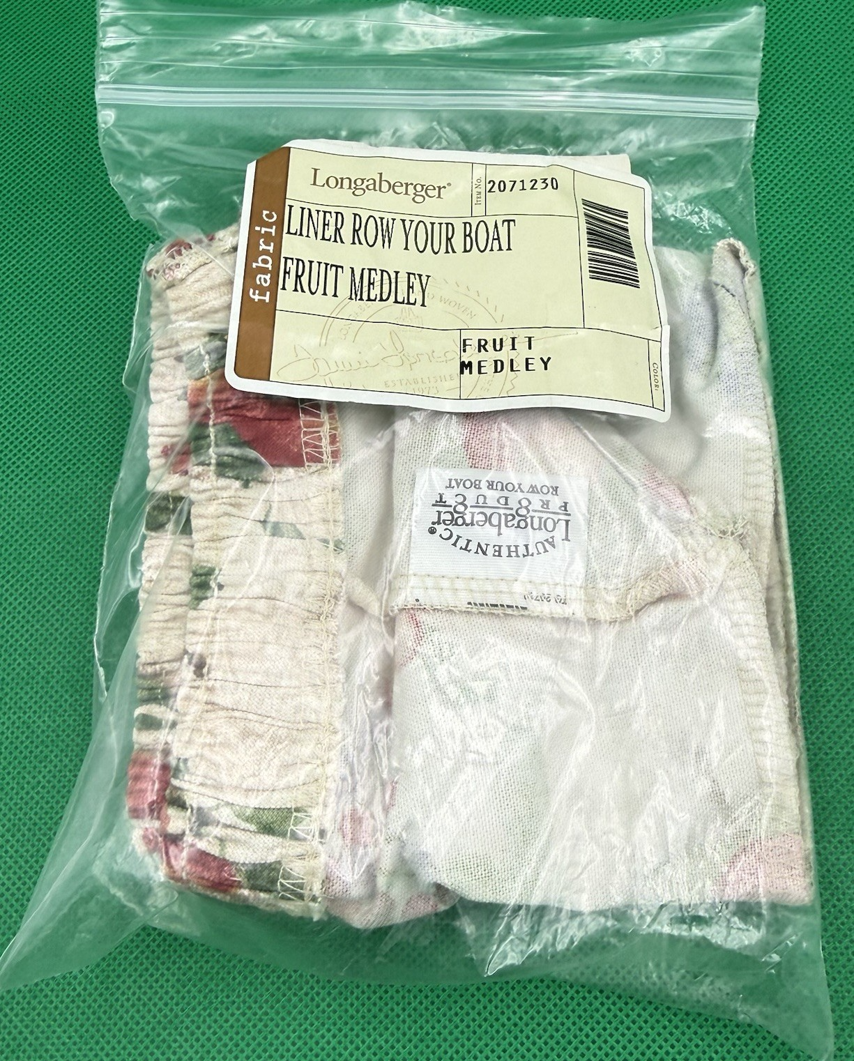 Longaberger Row Your Boat fabric liner only, fruit medley, in clear plastic packaging with brown label and barcode.