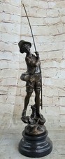 Bronze sculpture depicting a Boy fisherman throwing his line into the water Sale