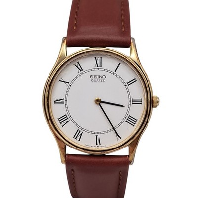 Vintage 1986 Seiko Quartz Ultra Slim Gold Dress Watch Roman Dial