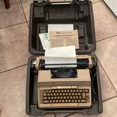 VINTAGE SMITH AND CORONA SUPER CORRECT XT ELECTRIC TYPEWRITER WITH CASE