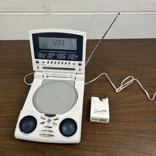 Sharper Image S1786 Portable Radio/Alarm Clock, Sound Soother Zip Connect SEC