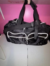 NWOT Black and White XL Men’s Multi Pocket Duffle Bag