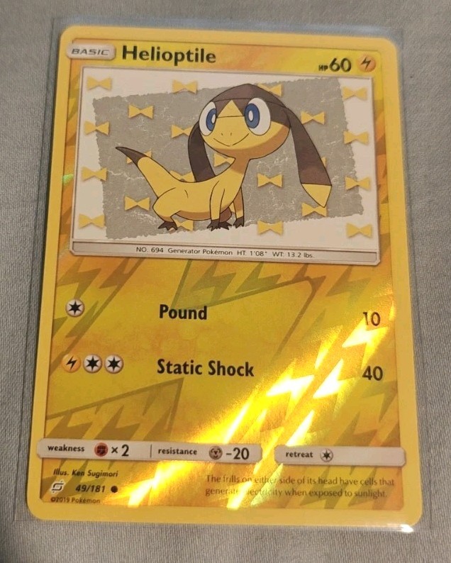 Pokemon TCG Helioptile 49/181 Sm-Team Up Reverse Holo Mint Card