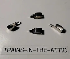 LIONEL COLLECTOR SLIDE SHOE PART 1661-33. PACK OF (4). NEW