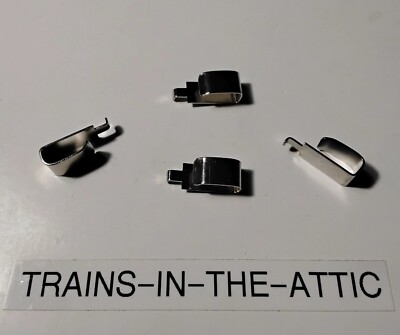 LIONEL COLLECTOR SLIDE SHOE PART 1661-33. PACK OF (4). NEW