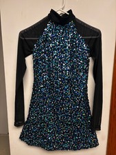 Revolution blue and black sequin dance costume with mesh sleeves and open back