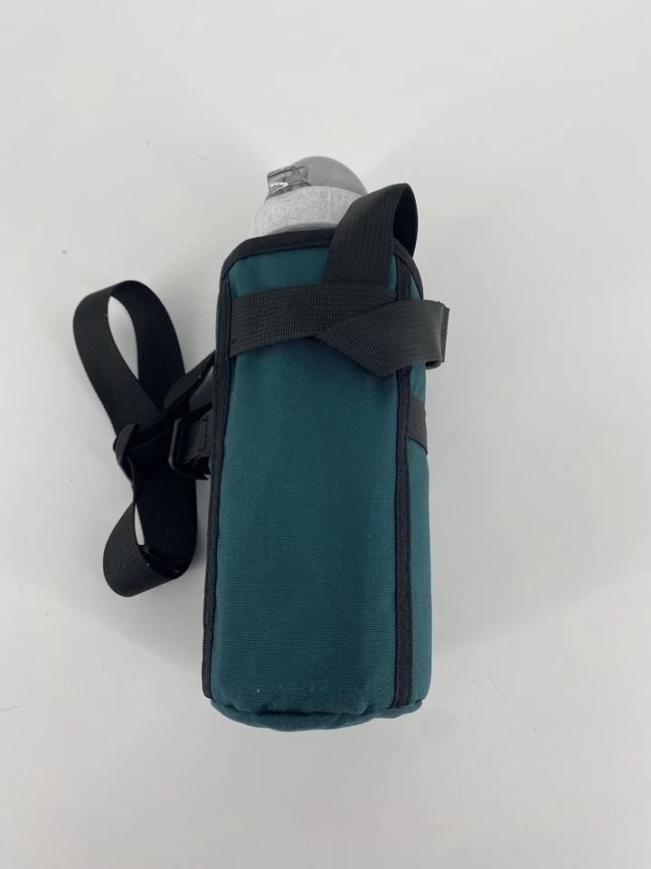 Botella de agua ajustable Eagle Creek de colección con soporte para bolsillo botella incluida verde Foto 3 de 4