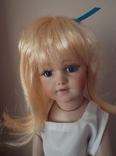 11-12 inch ECONOMY DOLLS WIG IN APRICOT BLONDE WITH RIBBON