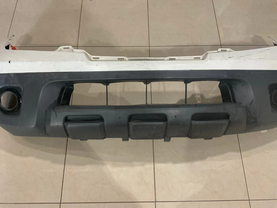Cubierta de parachoques superior delantera blanca Nissan Frontier 62022+ZL00B 2009-2021 OEM Foto 3 de 4