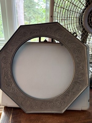 Vintage Metal Plateholder/Frame with a hallmark with a figure.