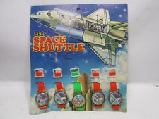5 Vintage Space Shuttle Toy Watches on Partial Display Card