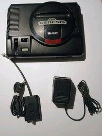 Sega Genesis Model 1601  Console  w/ AC Adapter An Aux Adapter  