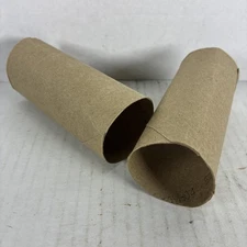 2 Empty Toilet Paper Rolls Clean Cardboard Tubes.  These Once Held Charmin