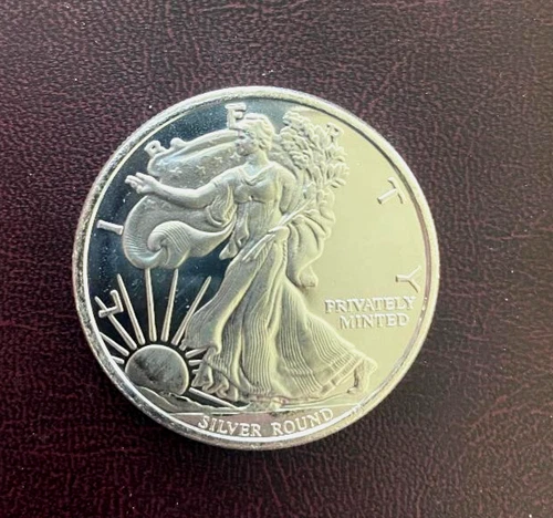 One-ounce silver round .999 silver. " Money Metals"