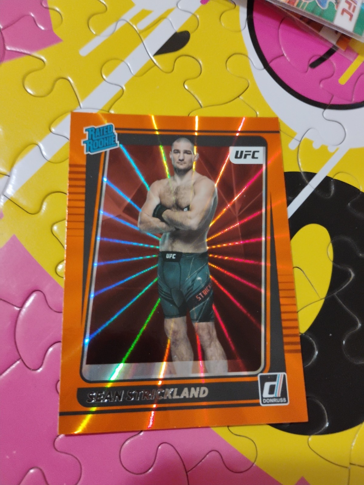 2022 Panini Donruss UFC Sean Strickland #206 Orange Laser Holo rated rookie RC