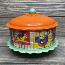Vintage Plastic Spinning Top Bells Carousel Orange Teal