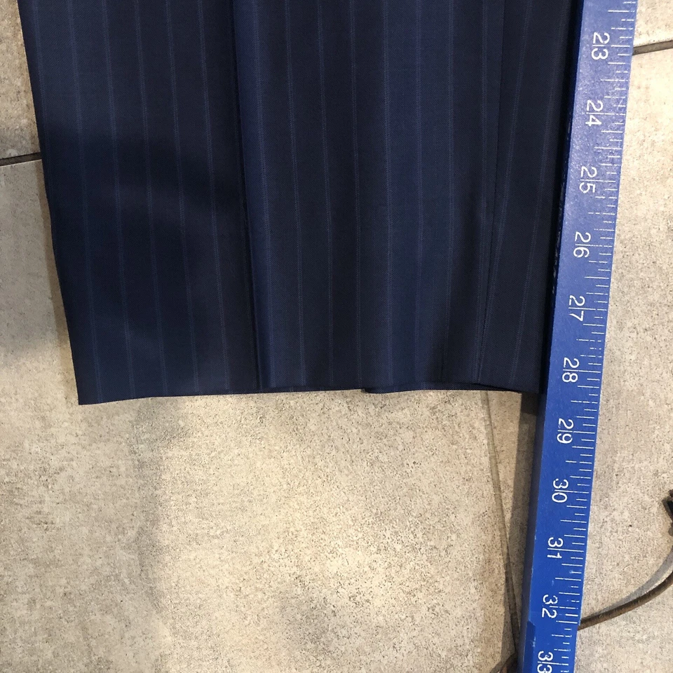 Pantalones de vestir Canali 1934 para hombre 34x29 azul lana Tessuto frente plano Italia Foto 4 de 4