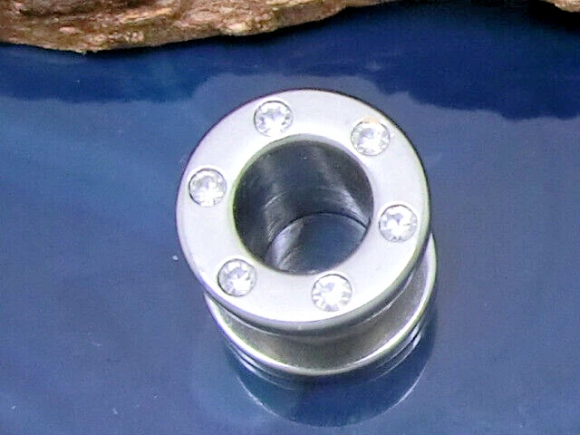 1 Pezzo Flesh Tunnel Ø 8mm Filettatura a Vite Ear Plug Acciaio Cristallo Chiaro - Immagine 2 di 2