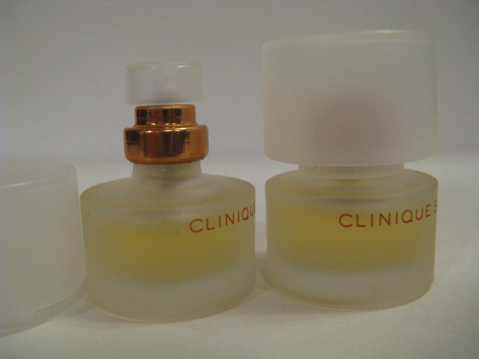 Lot of 2 Discontinued Clinique Simply parfum 0.14oz.each,spray bottles,no boxes.