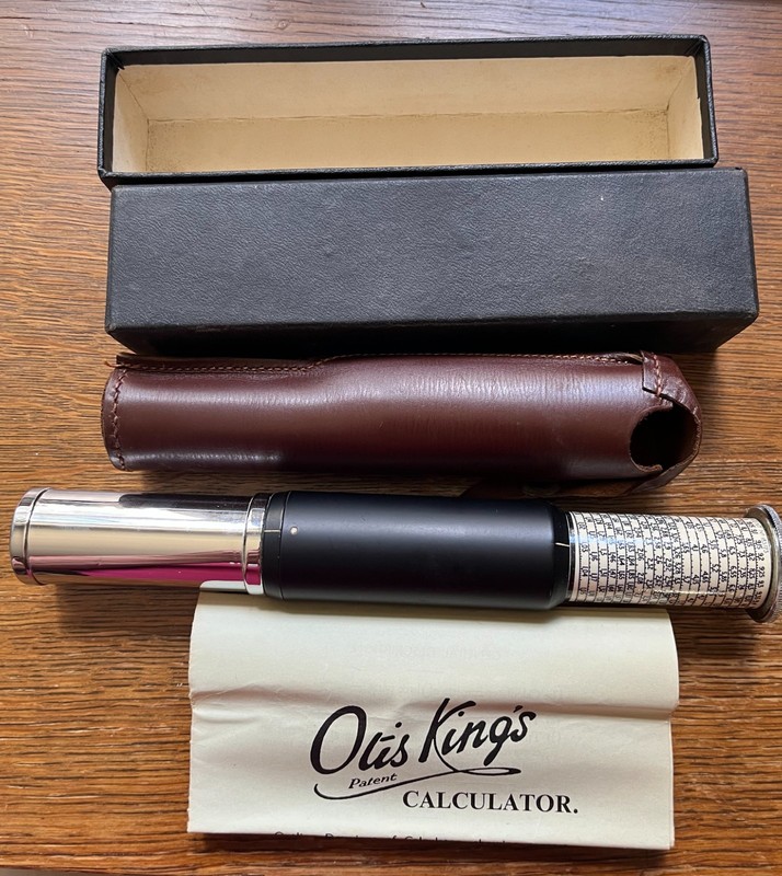 Otis King Model L leather cased cylindrical slide rule calculator, complete