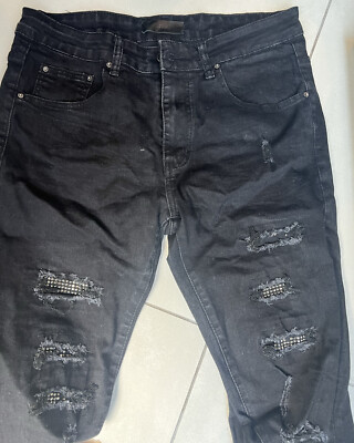 Amiri Crystal Thrasher Distressed Jeans UK