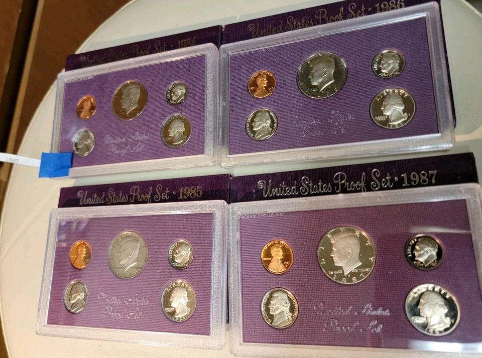 Lot 1984,1985,1986,1987 Proof Set With Box Holder Slight Blemish Back Of 87 Case - Image 2 of 4