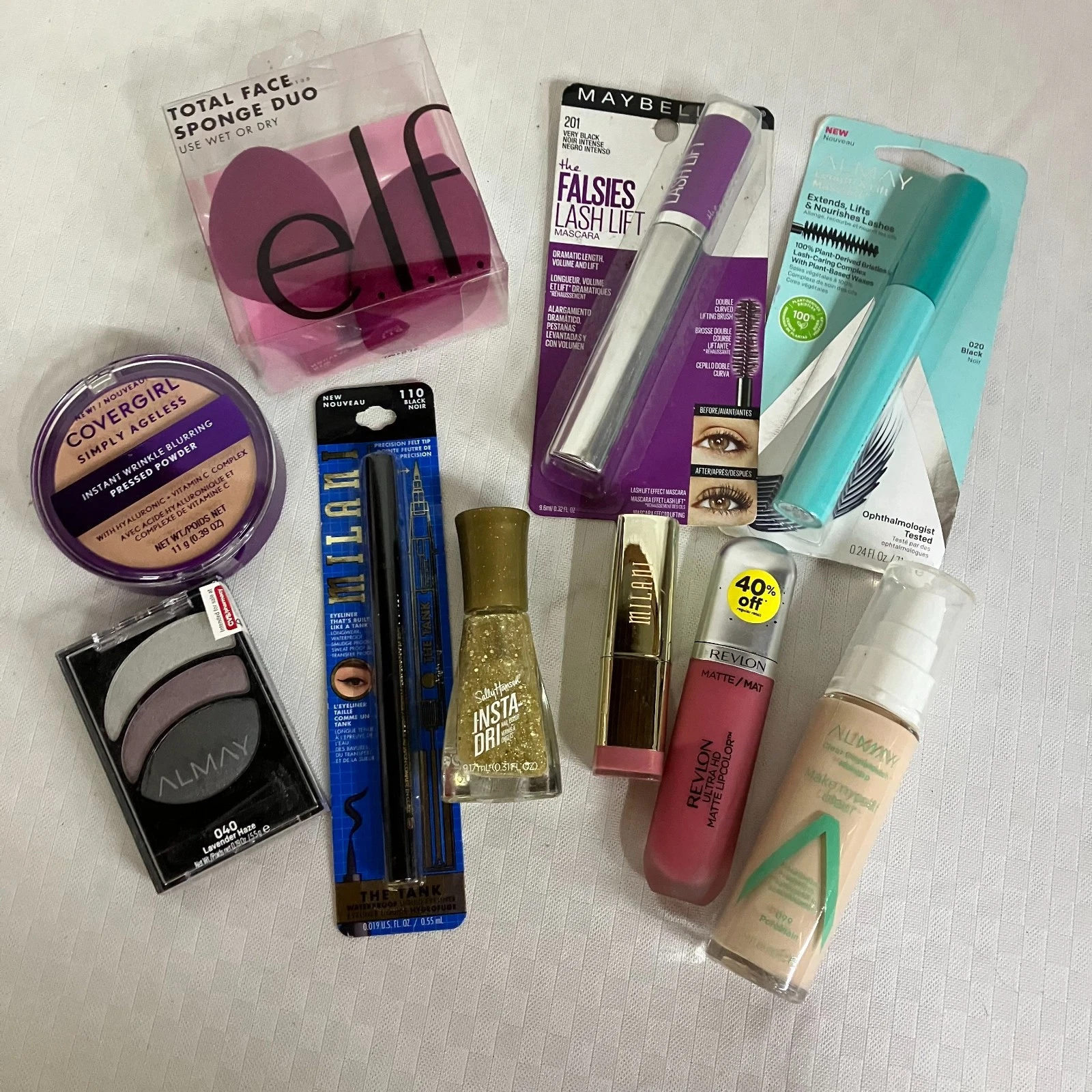 Mascara, Lipstick, Foundation, Eyeshadow, More 10-Piece Drugstore Makeup Kit New
Opens in a new wind