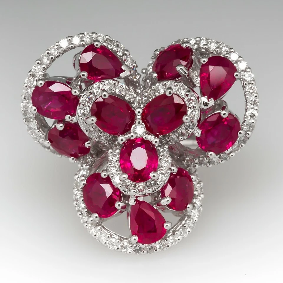 Juego de anillo de 92 circonitas con contornos piedra ovalada y corte pera 9 ovalada con ritmo de rubí rojo  Foto 2 de 4