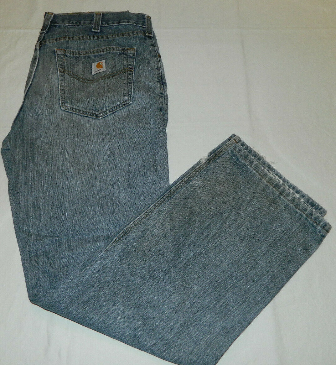 Carhartt Men 34x32 Relaxed fit faded bedrock holter jeans (Mea 34x32