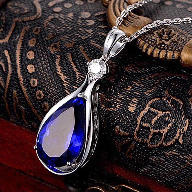 Silver necklace with shop blue pendant