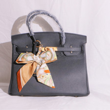 Black Leather Handbag with Golden Hardware