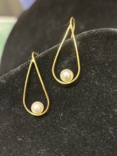 Repurposed Mikimoto Pearl In A Simple Gold Wire Frame