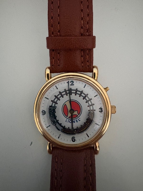 Lionel wrist watch with tin