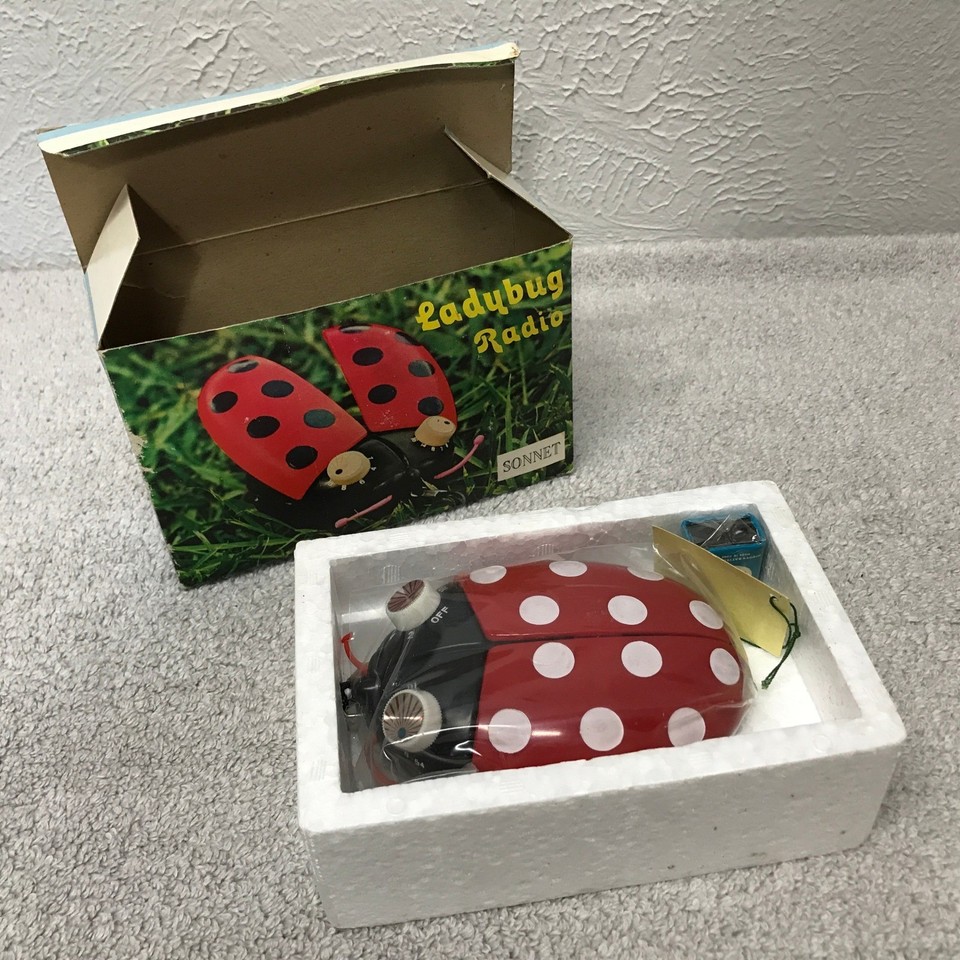 A red polka-dot ladybug-shaped transistor radio from Hong Kong — one of the most whimsical and visually iconic novelty radios of the vintage era.