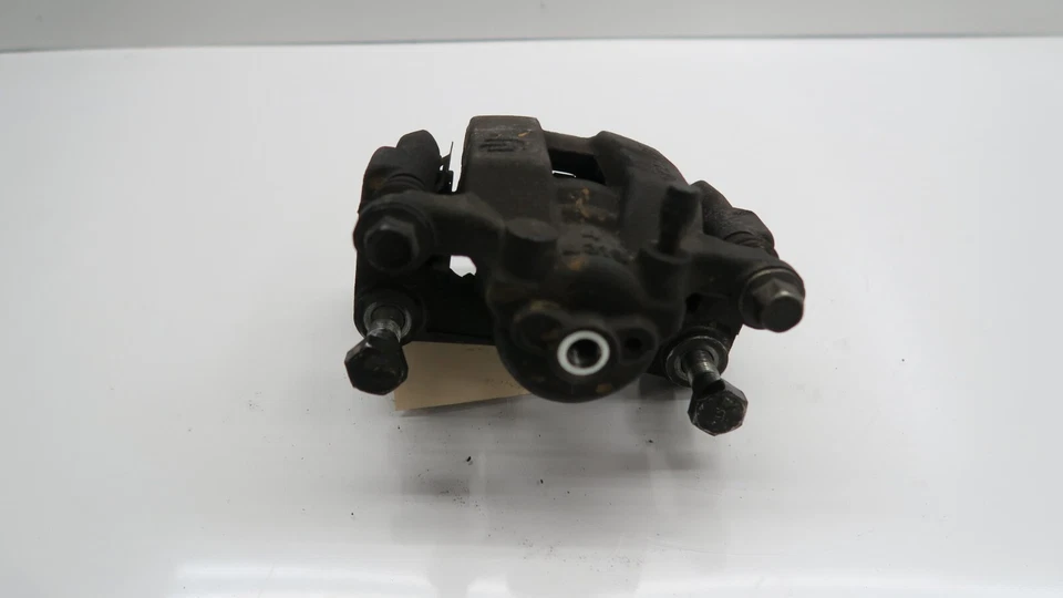 Pinza de freno trasera derecha Nissan Quest 2011-2017 OEM Foto 3 de 4