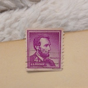 u.s. postage stamp 4 cent abraham lincoln purple used single