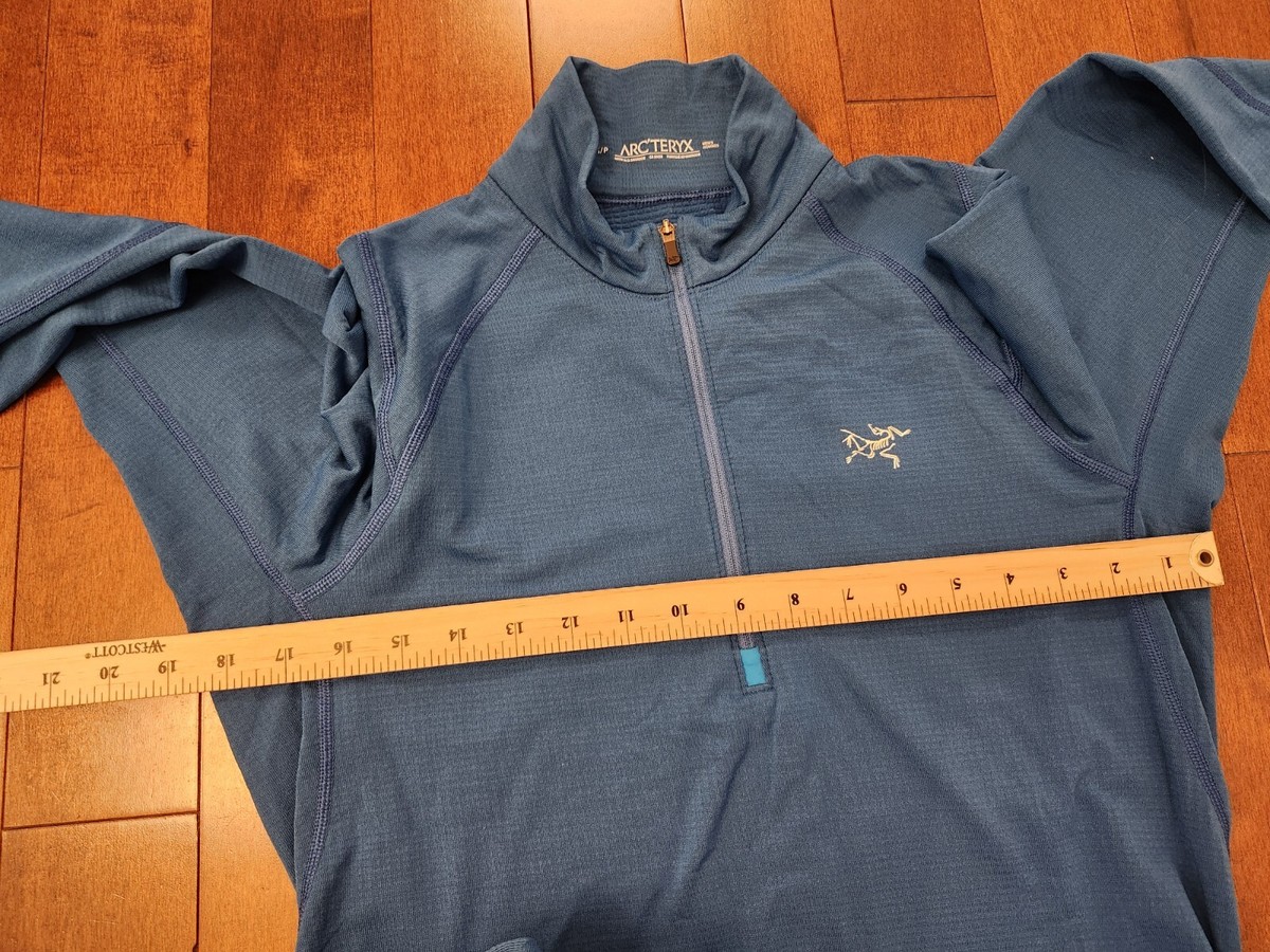 Arcteryx men's blue long sleeve half zip pullover top in Arcteryx men's blue long sleeve half zip pullover top in