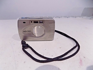 Minolta Vectis 300 APS analoge Kompaktkamera silber UNGETESTET Verkauf als ERSATZTEILE/TEILE