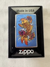 Zippo oil lighterZippo lighter with carp and hibiscus design